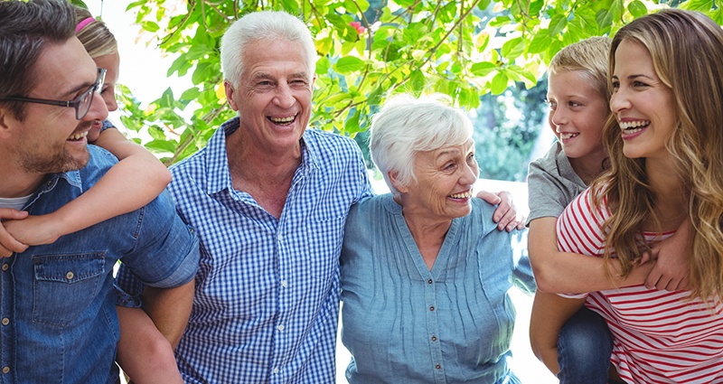 Happiness Couple with family enjoying retirement